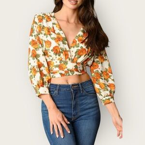 Lush orange flower crop top with shoulder pads. Worn twice. Size large.